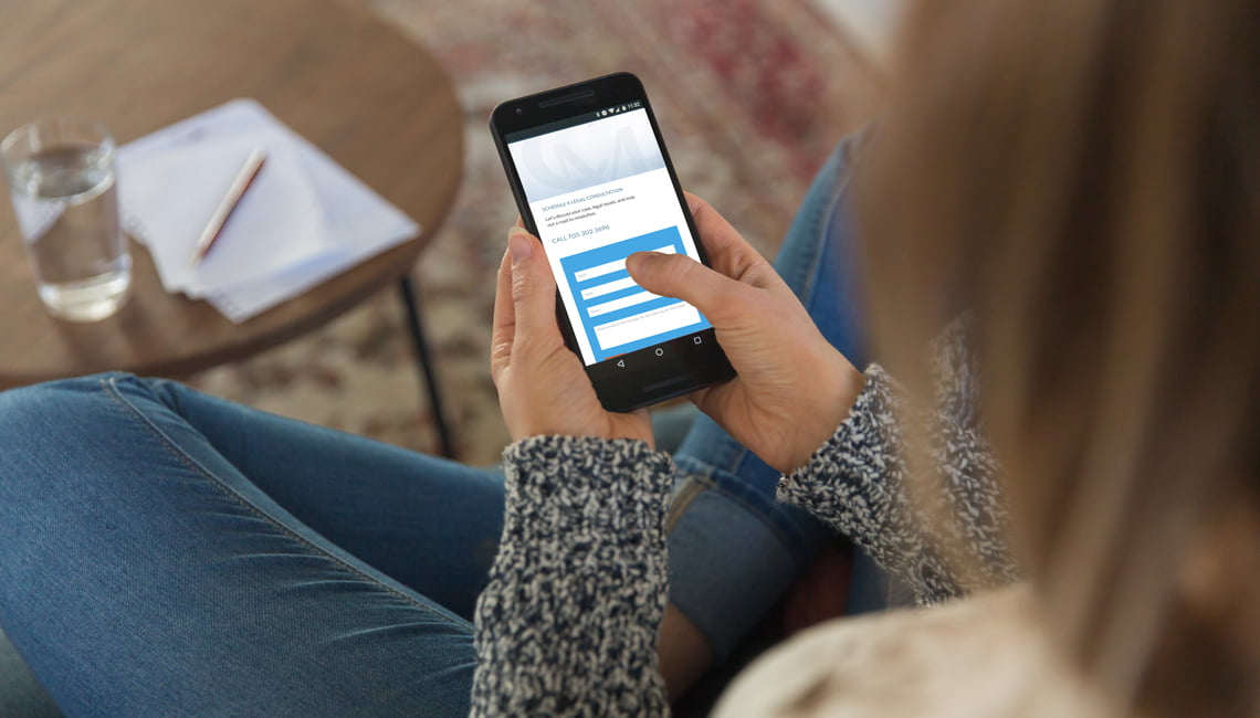 a woman looking at her phone